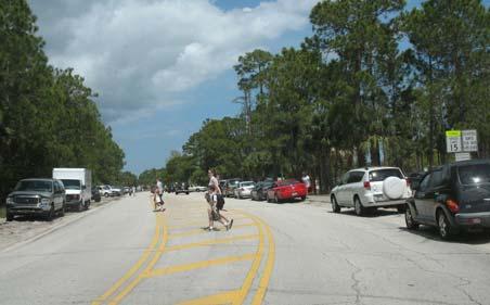 Recommendation: The City should consider the use of bollards or fencing in areas where motorists park on the sidewalk.