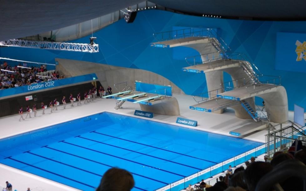 Specifications for a Diving Pool Whether diving platforms are sited into the deep end of the main swimming pool or sited into a pool exclusively for diving the depth and spatial specification must