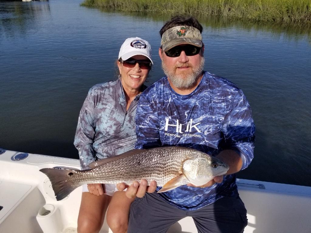 Dana and Mark Spyker are showing off their just caught soon to be released