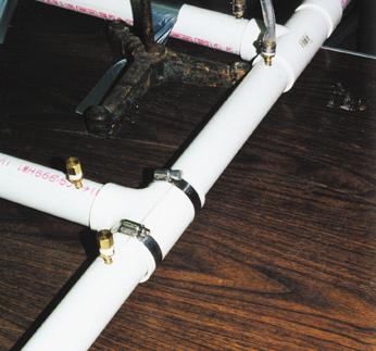 This experimental setup shows a tap in the foreground and a T-fitting in the background. 220. Therefore, for a 150 mm (6 in.) pipe, the loss caused by a 120 mm (4.8 in.