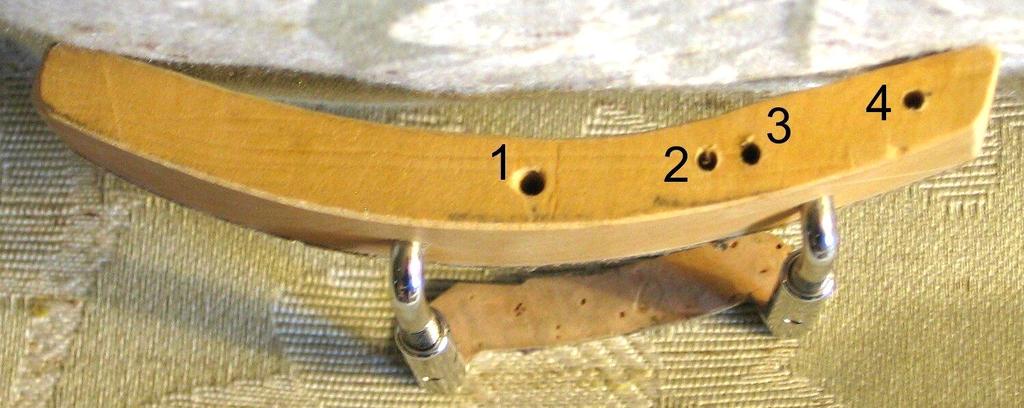 For topper placement fully to the left of the tailpiece ( leftmounted ), snap the topper into holes 1 and 3 as diagrammed below.