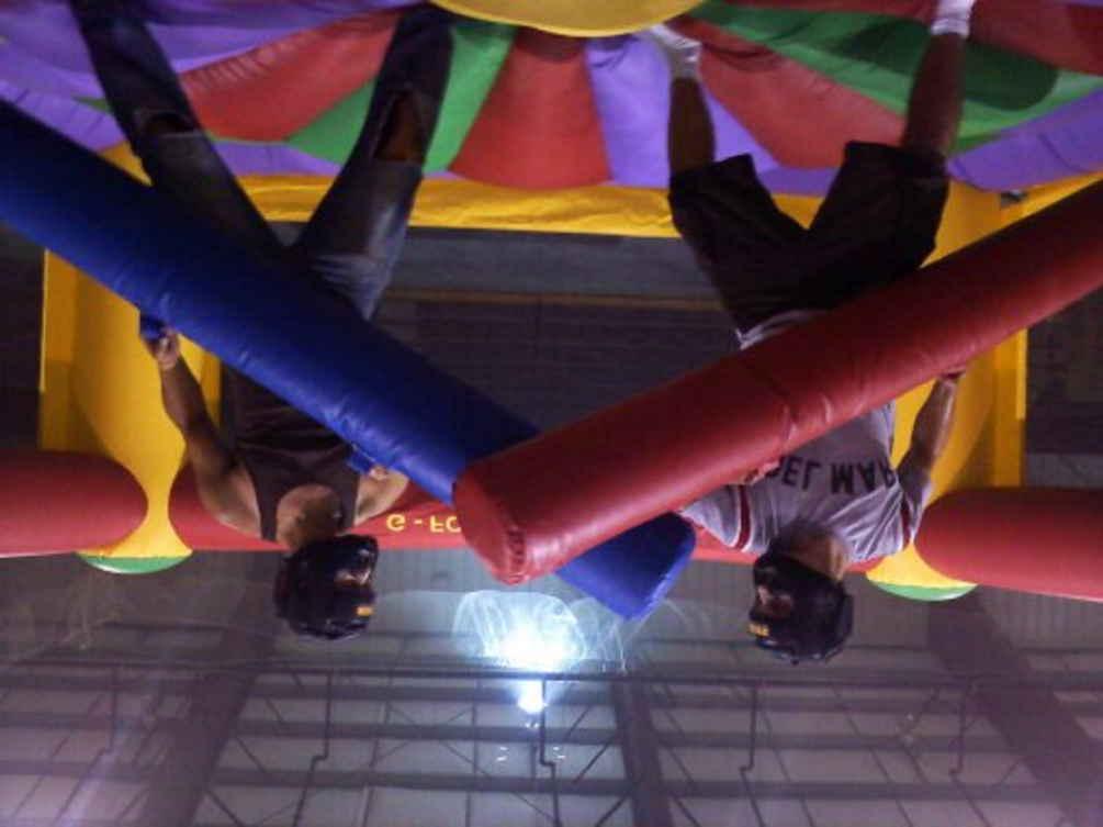Giant Bounce House, Jousting & Boxing Combo Inflatable A fun way for "kids" of all ages to