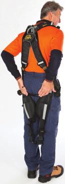Hold by shoulder straps with D Ring facing away from