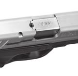 slide/ejection port, (FIGURE 11) noting an opening at the rear of the barrel hood. By looking into this opening, you can observe whether or not a round is in the firearm s chamber.