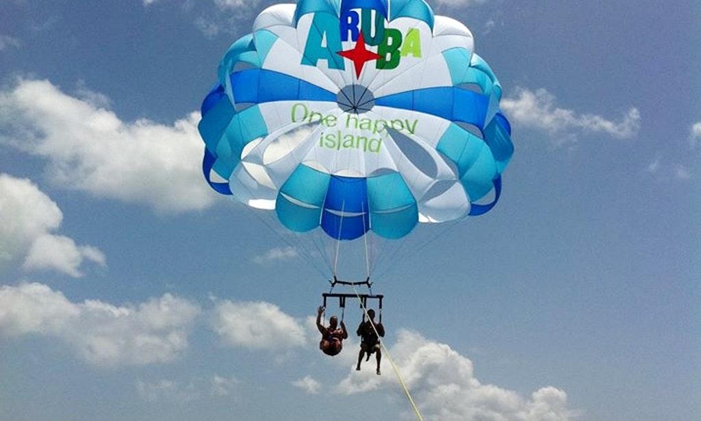 Parasailing Fly high above Aruba s High Rise Hotel Palm Beach. Bring along a camera and capture a most memorable view. Parasailing is safe and easy!