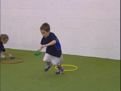 ACTIVITY 3 RUNNING - BEAN BAG TRANSFER HURLING / FOOTBALL FITNESS EXERCISE This is an exercise to develop running and coordination skills The players work in teams Every second player transfers a