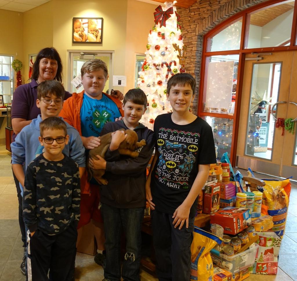 4-H Archery Club News The club officers delivered donated items to the McKamey Animal Shelter.