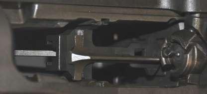 To clear the rifle, pull the operating rod handle all the way to the rear (ensure that the bolt is fully rearward and not