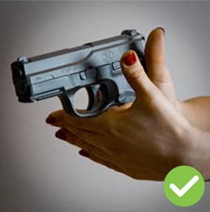 Make contact with as much of the handgun's exposed grip area as possible with the palm of your weak hand as you wrap it around your strong