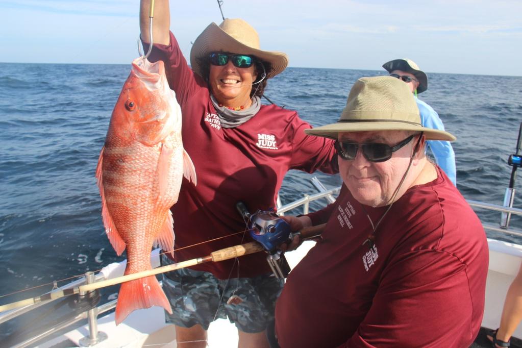 More on Genuine red snapper keeping season! Captain Kathy Brown of Miss Judy Charters is holding Captain Steve Triple Trouble Howell just caught soon to be thrown in the cooler genuine red snapper!