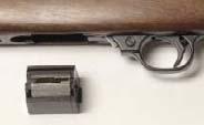 Magazine - This is the part that holds the ammunition in a repeating firearm until it is needed. It can look like a tube, a box that is built into the gun, or a box that can be removed from the gun.