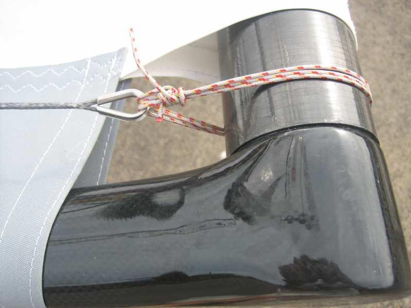 Tie one end of the 2mm wire rear wing bar brace around one aft end of the outer wing bar.
