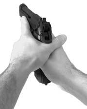 Place the web of the left index finger and thumb under the backstrap of the pistol. See figure 8-21.