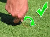 Repair Ball Marks (2) Right Way Return any loose turf to center of mark Insert tool