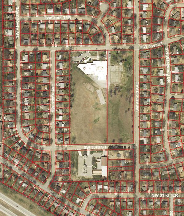 the 7.92 acre parcel which yields a building density of approximately 10%. For the proposed change in land-use, the building footprint will not change.