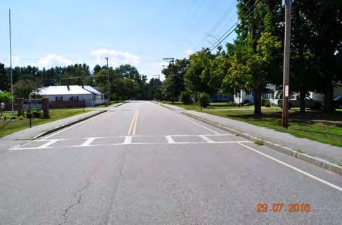 crosswalk to the school (lower right photo) and the segment of street requiring reconstruction