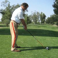 After impact the golf club swings back around your body and up towards your left shoulder.