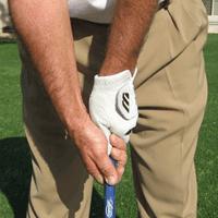 Neutral Strong You can grip the golf club in a weak position (no knuckles of the left hand showing), neutral (one knuckle of the left hand showing) or the strong position (2 or 3 knuckles of the left