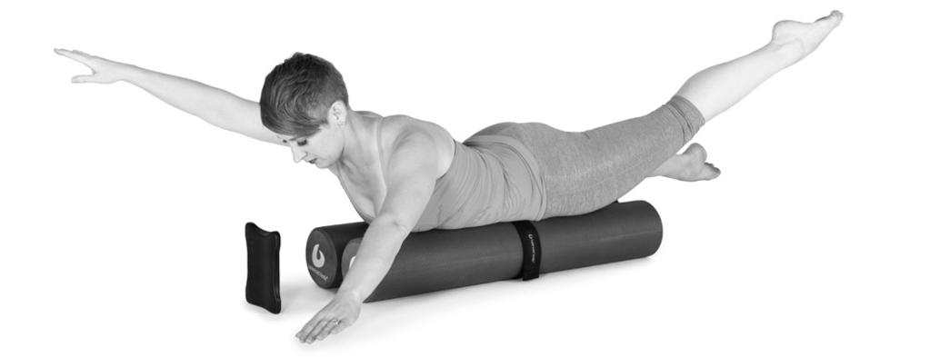 II. Prone Series Rollers Together, Headrest Flat A. SWIMMING Lie prone with chest, hips and thighs on rollers. Knees are off the edge of rollers, feet are plantar-flexed.