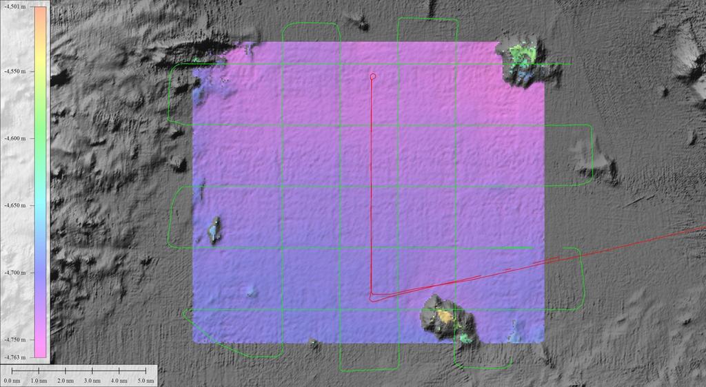 were gridded at 100 meters. The colored EM122 surface, shown here, is overlain on background bathymetry (SOEST Main Hawaiian Island Multibeam Synthesis) gridded at 50 m.