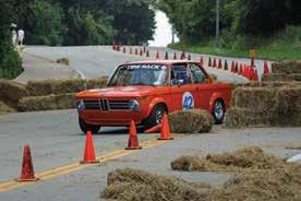 Karl Hughes exits the haybale chicane on the back straight in his 1973 BMW 2002. Mike Matune Racing isn t the only thing to see in Schenley Park that weekend.