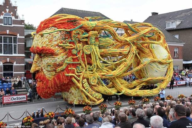 The region is a world supplier of dahlias. Here are pictures of a couple of the floats. See the following site for the rest. They are spectacular! http://www.dailymail.co.uk/news/article-3229900 Cost: $20.