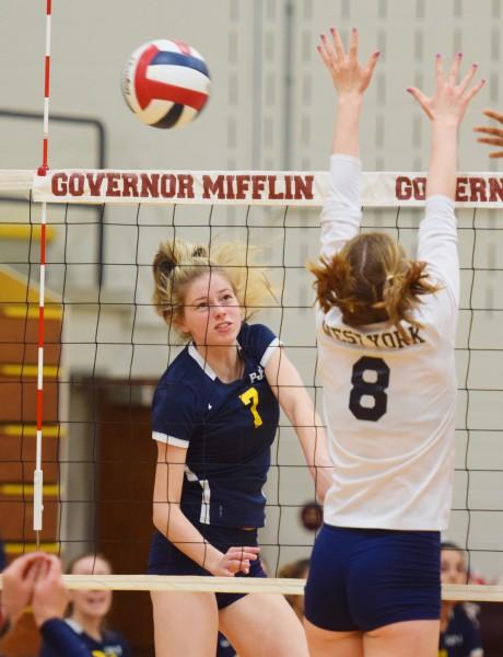 Pope John Paul II s Caitlin Gilinger (7) hits down the line for a kill against West York during a PIAA 3A quarterfinal Saturday at Gov. Mifflin.