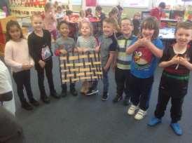 Next we made our very own tartan in small groups out of different coloured