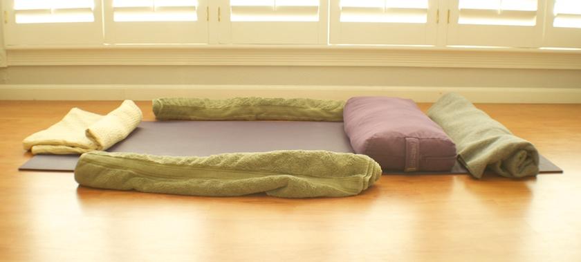 side on the blanket supports, slightly elevating the wrists. Savasana provides the final relaxation of your practice. Focus on bringing a sense of calm to the body and the mind.