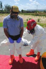 After completing decontamination, 2 Instruct the assistant to open the 3 Remove