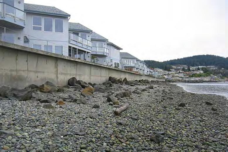 1. Barriers in large river deltas restrict the movement of fresh water and tides. 2. Small coastal inlets have been blocked off and filled in Shoreline has become shorter, 3.