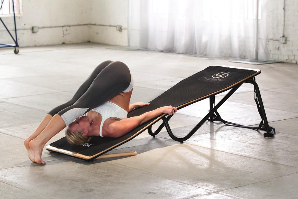 PLOW From ROLL UP grab side rails Use abdominals and press through rails Straighten legs and lift torso perpendicular to board Slowly lower straight legs overhead as far as you can take them If