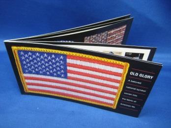 There are two pages containing ten stamps each. The remaining pages of the booklet are filled with images of flag-related ephemera, many from the collection of Richard D.