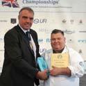 COMPETITION C NATIONAL POULTRY CHAMPIONSHIP SPONSORED BY THE WORSHIPFUL COMPANY OF POULTERS The National Poultry Champion MIKE CRATES OF E ASHTON FISHMONGERS WHO RECEIVES AN ENGRAVED DECANTER
