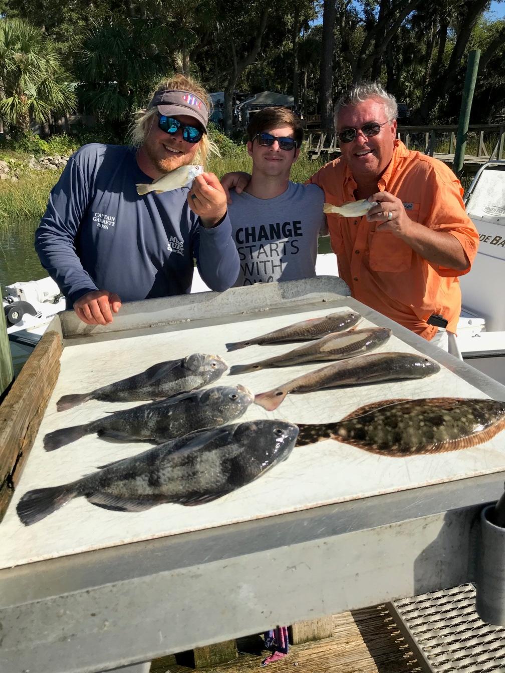 Captain Garrett Ross of Miss Judy Charters, Griffin Powell, and his father Jeff Savannah, Georgia are have a fun time showing off all of their fish! What does this mean?