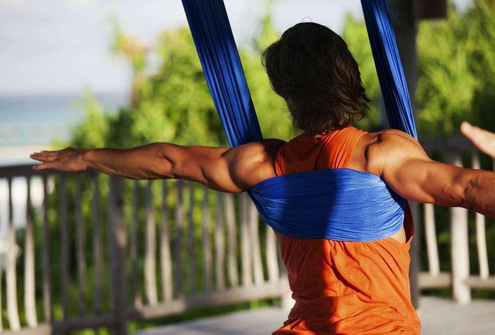 AERIAL YOGA INTRODUCTION Try something new with this yoga practice that brings