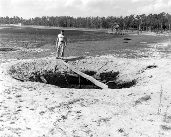 Page 6 of 6 Figure 5.3.1..8: Sinkhole in dry Lake Bradford photographed in 1955 by Red Kerce. Water normally flows in and out of Bradford Brook from the national forest.