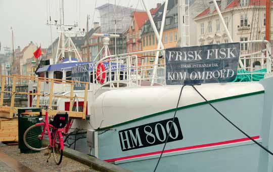 The re-modelled fishing vessel purchased by the guild is berthed in the centre of Copenhagen to sell sustainably-caught fish to consumers.