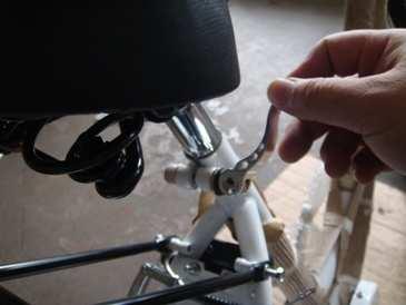Choose a pedal and start threading into the corresponding crank arm by hand turning the pedal axle toward the front of