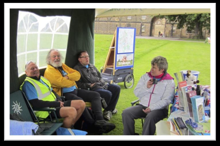 The Green Living Day team (who is the well dressed man in the jacket and tie) Some of the team keeping warm in the Gazebo Our ever popular skills course had around 80 participants