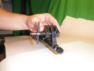 Turning the front sight post counter-clockwise raises the post and lowers the point of impact. (See Illustration #18) 2.