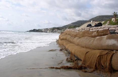action in early 2009 to develop a long term solution to protect against shoreline erosion and reduce the threat to private property.