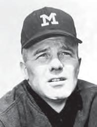 After taking over as head coach in 1948, he guided the Wolverines to a 9-0 mark, the Big Ten title and the national championship.