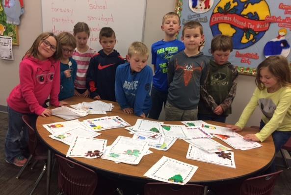 These 2nd grade students sent forty-nine Christmas messages to wounded soldiers.