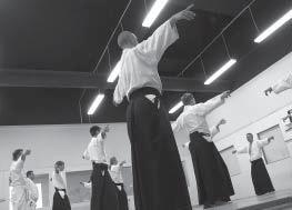 Warm-up exercise at the author s dojo in Malmö, Sweden. Photo by Anders Heinonen. elegance, and naturalness, should signify the movements of the aikidoist, whoever is the partner.