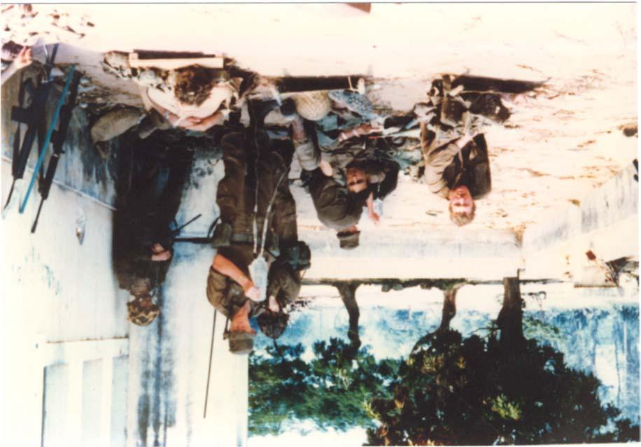 7C-7. Wounded paratroopers being