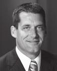 The Panthers joined the Missouri Valley Conference during his tenure. He was named the Valley s Coach of the Year in 1997, and is a member of UNI s Hall of Fame.