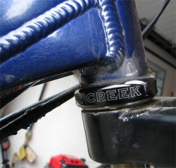 3.2 Frame Ovalizing. Look for ovalizing of the head tube and bottom bracket. On a bicycle frame, the basic term for ovalizing is when a circular tube/shell is forced into an oval shape.