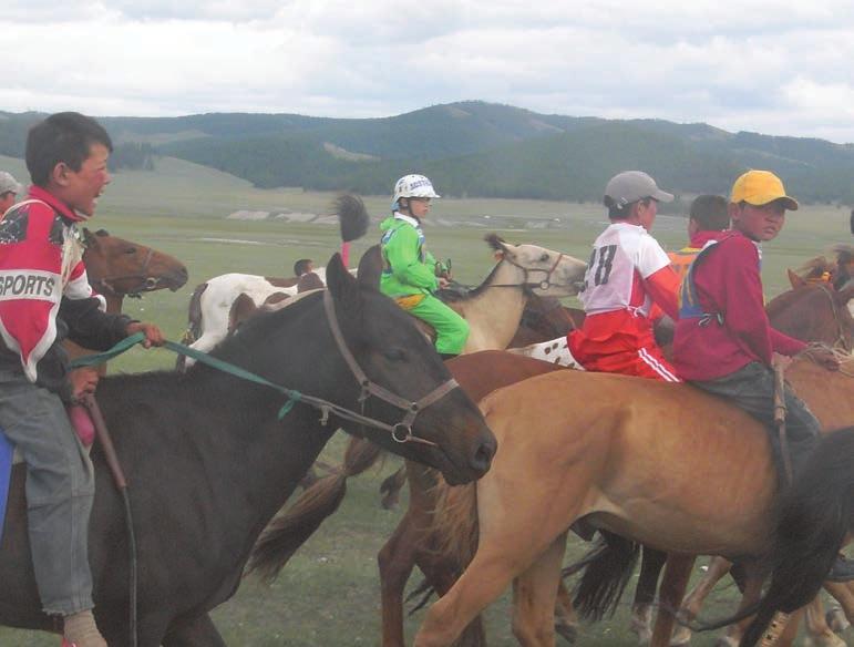 Young adventurer 2009 Riders at the Naadam festival horseraces. Angus is the rider in green. Thirteen-year-old Angus Paradice lives on a farm in New South Wales.