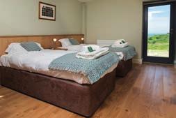 Every room is furnished with oak furniture that is hand made in Wales and a traditional Welsh blanket on every bed.